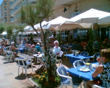 Mum (in the white top!) waiting for her lunch and of course beer!